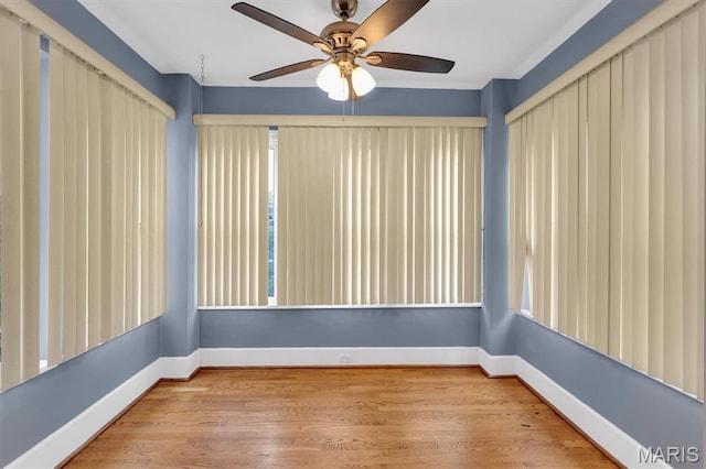 6026 Waterman Ave Unit 3E, Saint Louis, MO 63112 - unfurnished room featuring a ceiling fan, baseboards, and wood finished floors