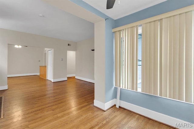 6026 Waterman Ave Unit 3E, Saint Louis, MO 63112 - spare room with ceiling fan, baseboards, and light wood-style flooring