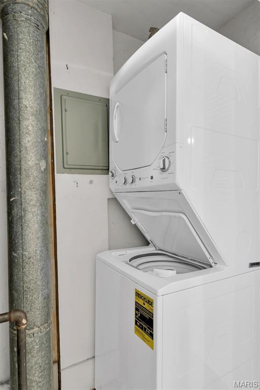 6026 Waterman Ave Unit 3E, Saint Louis, MO 63112 - washroom with stacked washing machine and dryer