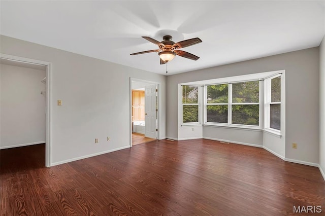 1045 Sprinters Row Dr, Florissant, MO 63034 - unfurnished room with ceiling fan, wood finished floors, and baseboards
