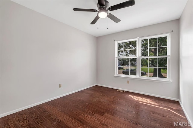 1045 Sprinters Row Dr, Florissant, MO 63034 - unfurnished room with wood finished floors, baseboards, and a ceiling fan