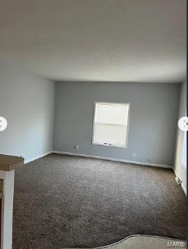 876 Mildred Ave, Cahokia, IL 62206 - empty room with carpet floors and baseboards