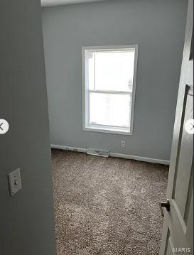 876 Mildred Ave, Cahokia, IL 62206 - unfurnished room with baseboards