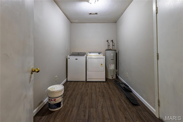 141 Saint Catherine Ln, New Madrid, MO 63869 - laundry room with electric water heater, washing machine and clothes dryer, wood finished floors, and baseboards