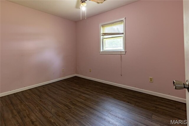141 Saint Catherine Ln, New Madrid, MO 63869 - unfurnished room with a ceiling fan, dark wood-style floors, and baseboards