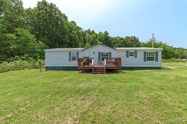 28079 Sapphire, Richland, MO 65556 - rear view of property with a wooden deck, a lawn, and metal roof