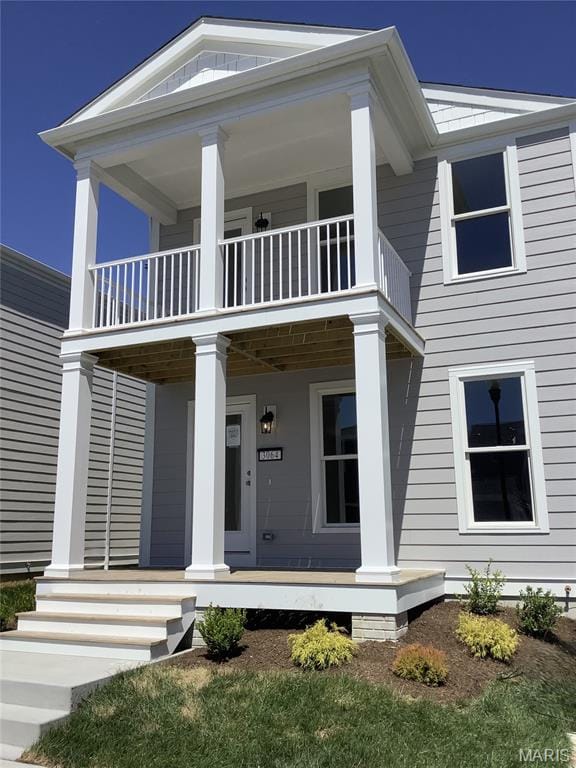 3064 Pirogue St, Saint Charles, MO 63301 - greek revival inspired property with a balcony and a porch