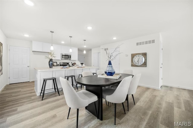 3064 Pirogue St, Saint Charles, MO 63301 - dining area with light wood-style flooring, recessed lighting, and baseboards