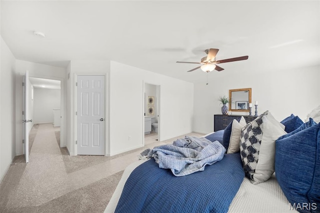 3064 Pirogue St, Saint Charles, MO 63301 - bedroom with light carpet, baseboards, a ceiling fan, and ensuite bathroom