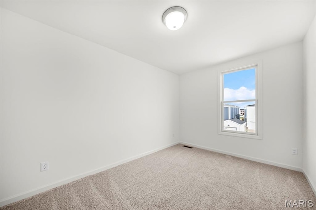 3064 Pirogue St, Saint Charles, MO 63301 - unfurnished room featuring light carpet and baseboards
