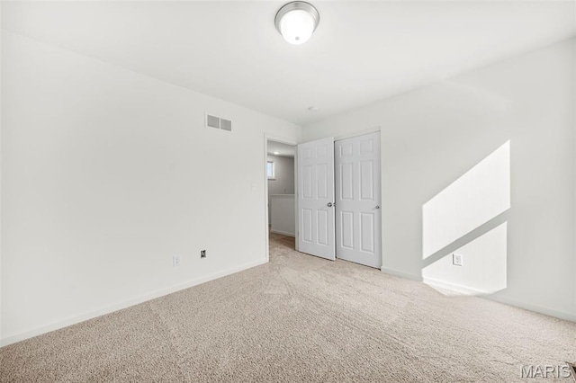 3064 Pirogue St, Saint Charles, MO 63301 - unfurnished bedroom featuring carpet flooring, baseboards, and a closet