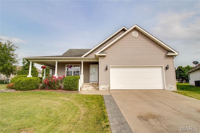 2 Breezeway Ct, Jerseyville, IL 62052 - view of front of property with a front yard, driveway, a garage, central air condition unit, and a porch