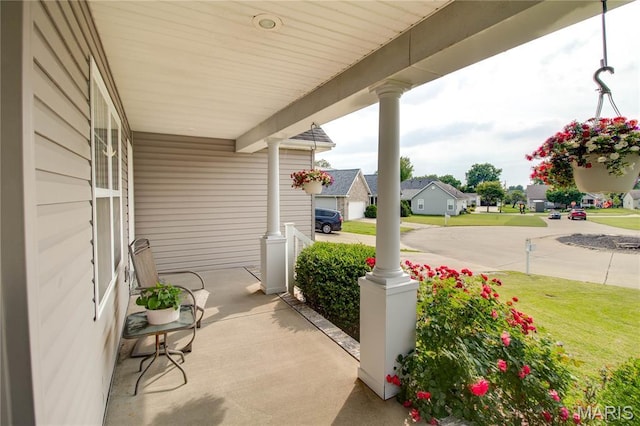 2 Breezeway Ct, Jerseyville, IL 62052 - porch featuring a residential view and a yard