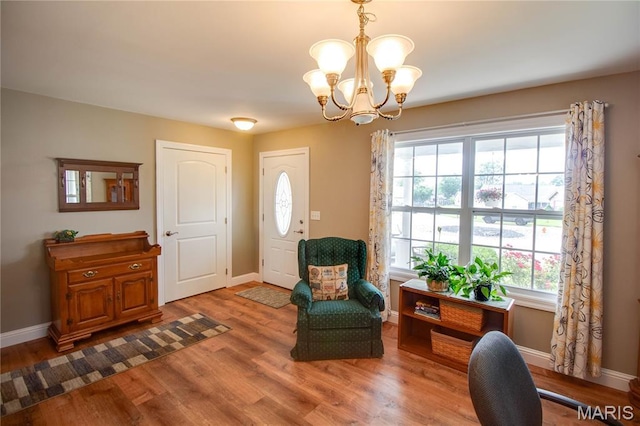2 Breezeway Ct, Jerseyville, IL 62052 - foyer entrance featuring a chandelier, healthy amount of natural light, and wood finished floors