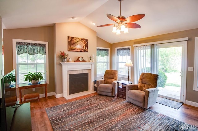 2 Breezeway Ct, Jerseyville, IL 62052 - sitting room featuring lofted ceiling, wood finished floors, healthy amount of natural light, a ceiling fan, and a tile fireplace