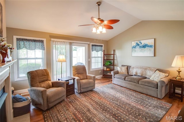 2 Breezeway Ct, Jerseyville, IL 62052 - living room with vaulted ceiling, wood finished floors, ceiling fan, a fireplace with flush hearth, and baseboards
