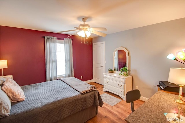 2 Breezeway Ct, Jerseyville, IL 62052 - bedroom with light wood-type flooring, baseboards, and a ceiling fan
