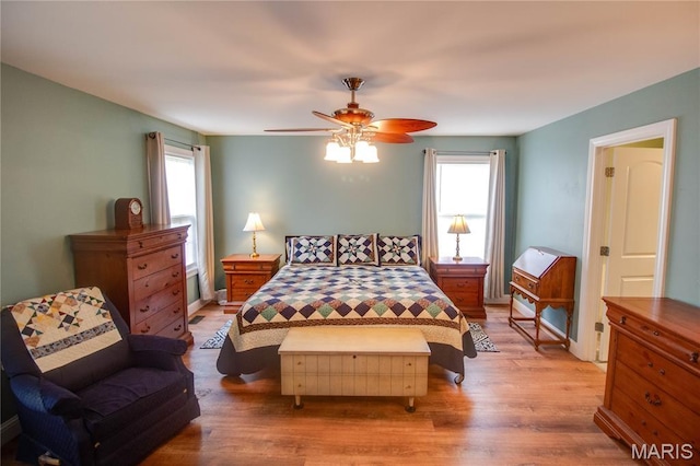 2 Breezeway Ct, Jerseyville, IL 62052 - bedroom featuring light wood finished floors, multiple windows, and ceiling fan