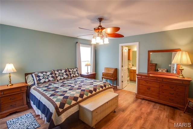 2 Breezeway Ct, Jerseyville, IL 62052 - bedroom with light wood-type flooring, a ceiling fan, and ensuite bath