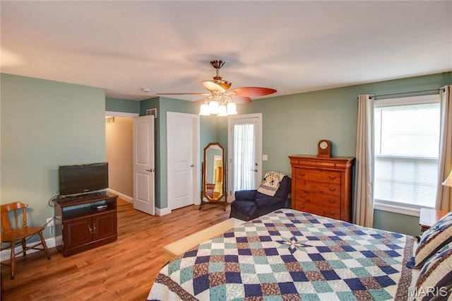 2 Breezeway Ct, Jerseyville, IL 62052 - bedroom with light wood-type flooring, baseboards, and ceiling fan