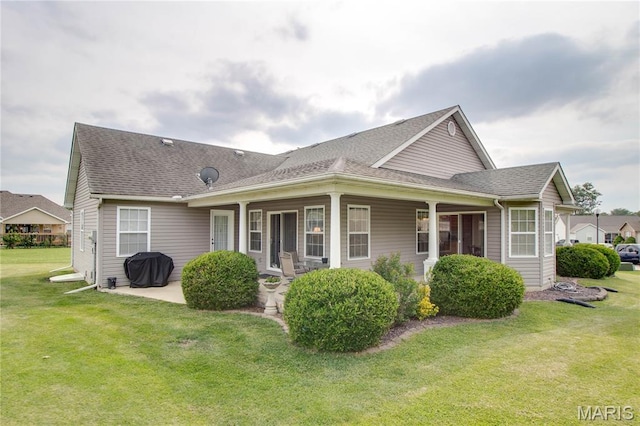 2 Breezeway Ct, Jerseyville, IL 62052 - view of side of property with a lawn and roof with shingles
