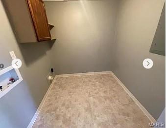 862 Saint Benedict, Cahokia, IL 62206 - laundry room featuring cabinet space, washer hookup, electric dryer hookup, and baseboards