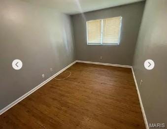 862 Saint Benedict, Cahokia, IL 62206 - spare room featuring baseboards and wood finished floors