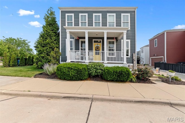 3204 Hadrian St, Saint Charles, MO 63301 - townhome / multi-family property featuring a porch