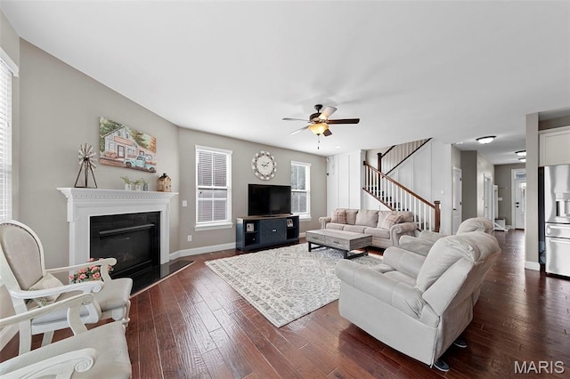 3204 Hadrian St, Saint Charles, MO 63301 - living area featuring ceiling fan, stairs, dark wood finished floors, and baseboards