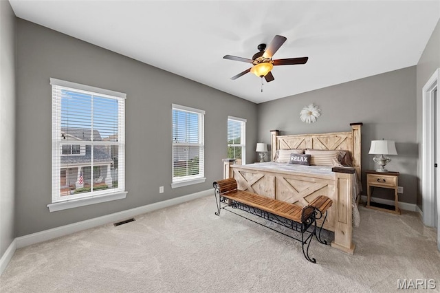 3204 Hadrian St, Saint Charles, MO 63301 - bedroom featuring light colored carpet, baseboards, and a ceiling fan