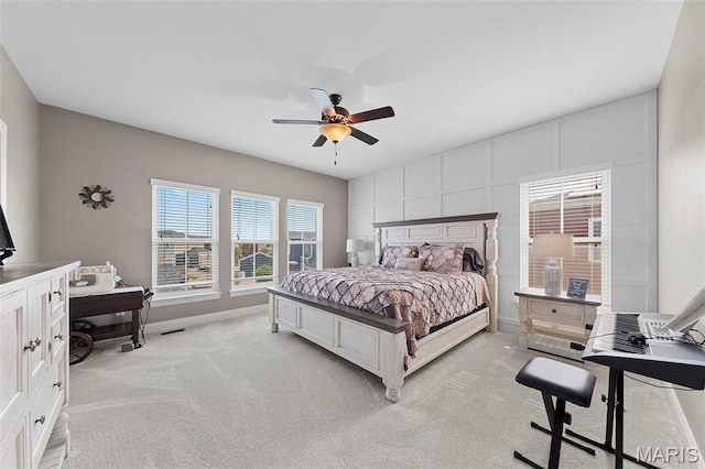 3204 Hadrian St, Saint Charles, MO 63301 - bedroom featuring baseboards, light colored carpet, an office area, and a ceiling fan