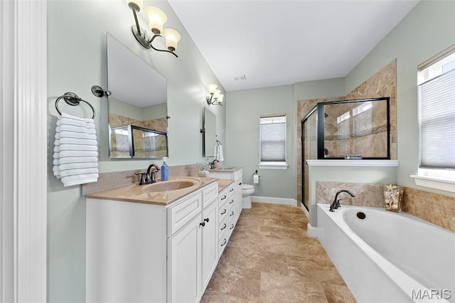 3204 Hadrian St, Saint Charles, MO 63301 - bathroom featuring a stall shower, double vanity, a bath, and toilet