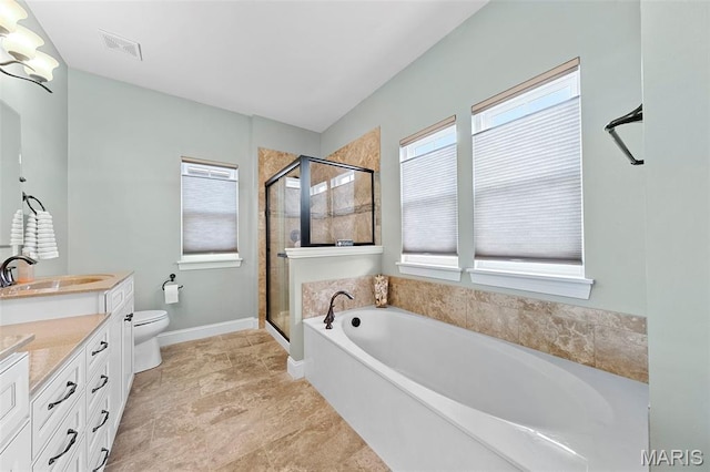 3204 Hadrian St, Saint Charles, MO 63301 - bathroom featuring vanity, a bath, a shower stall, toilet, and baseboards