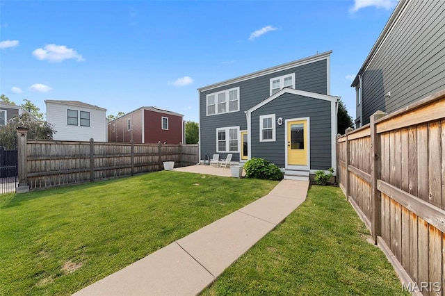 3204 Hadrian St, Saint Charles, MO 63301 - rear view of property featuring entry steps and a patio area