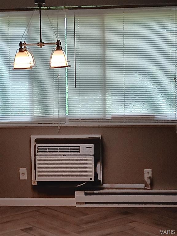 7731 Hazelcrest Dr Unit B, Hazelwood, MO 63042 - detailed view of wood finished floors and baseboards