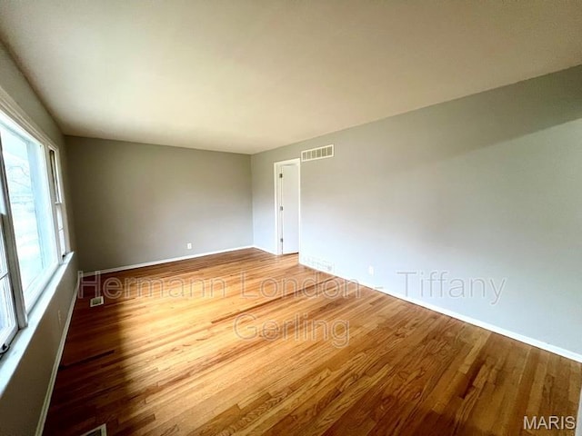 170 Ruth Dr, Florissant, MO 63031 - unfurnished room with wood finished floors and baseboards
