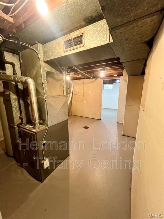 170 Ruth Dr, Florissant, MO 63031 - unfinished below grade area featuring heating unit