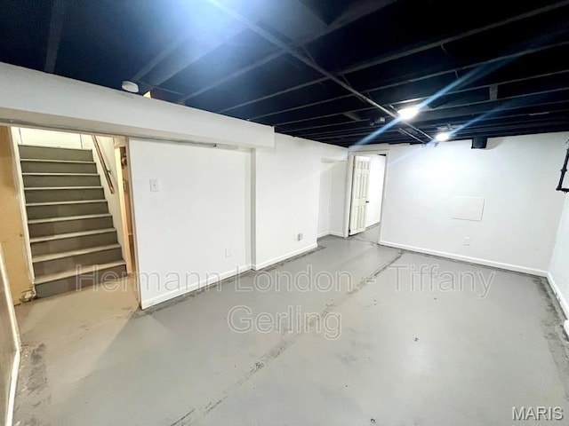 170 Ruth Dr, Florissant, MO 63031 - finished below grade area featuring stairway and baseboards