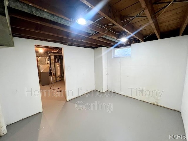 170 Ruth Dr, Florissant, MO 63031 - below grade area featuring water heater and heating unit