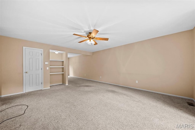 4505 Sherman Park Dr, Saint Charles, MO 63303 - carpeted empty room with baseboards and a ceiling fan