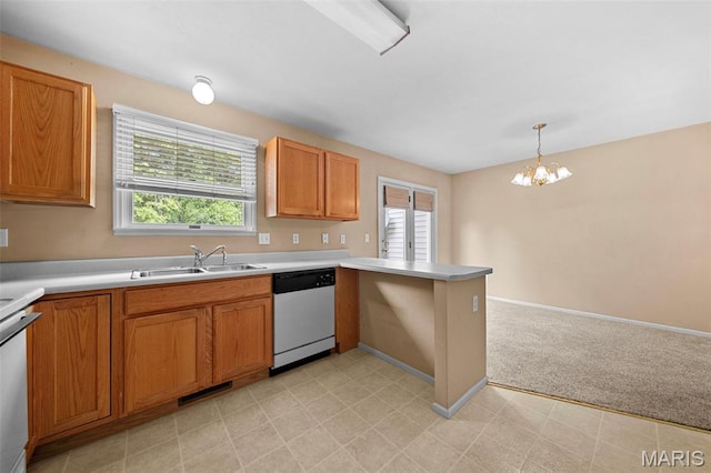 4505 Sherman Park Dr, Saint Charles, MO 63303 - kitchen featuring dishwasher, a sink, healthy amount of natural light, and range