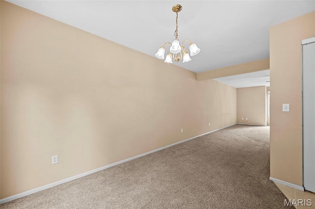 4505 Sherman Park Dr, Saint Charles, MO 63303 - spare room featuring light colored carpet, baseboards, and a chandelier