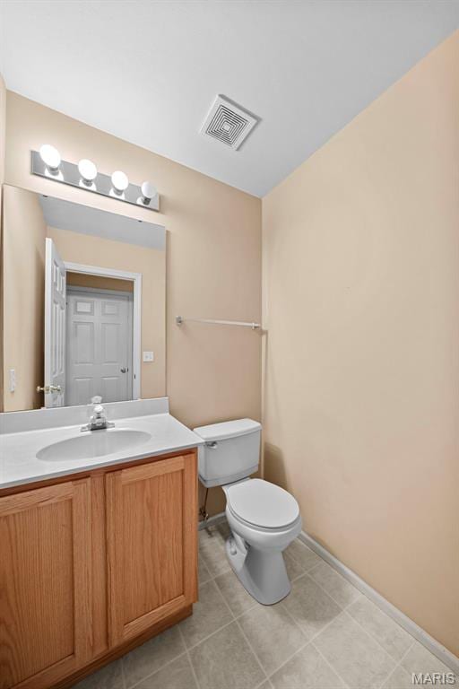 4505 Sherman Park Dr, Saint Charles, MO 63303 - half bath with toilet, vanity, baseboards, and tile patterned flooring