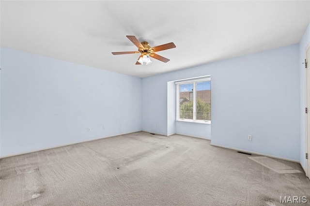 4505 Sherman Park Dr, Saint Charles, MO 63303 - carpeted spare room with a ceiling fan