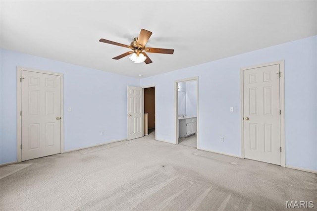 4505 Sherman Park Dr, Saint Charles, MO 63303 - unfurnished bedroom with light carpet, ensuite bathroom, baseboards, and a ceiling fan