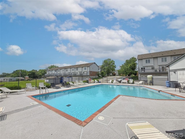 4505 Sherman Park Dr, Saint Charles, MO 63303 - community pool featuring a patio