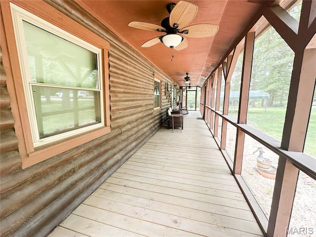 1 Timber Ln, Salem, MO 65560 - unfurnished sunroom featuring a ceiling fan