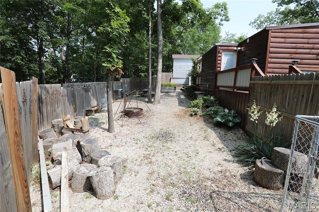 80 Lakeview Dr, Wappapello, MO 63966 - fenced backyard featuring a fire pit