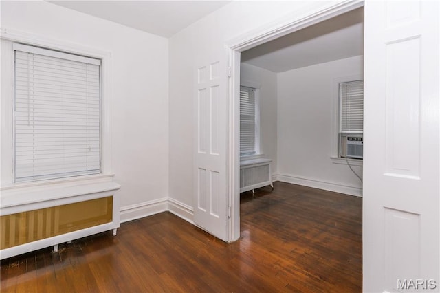 7360 Dartmouth Ave, University City, MO 63130 - corridor featuring dark wood-style flooring and cooling unit