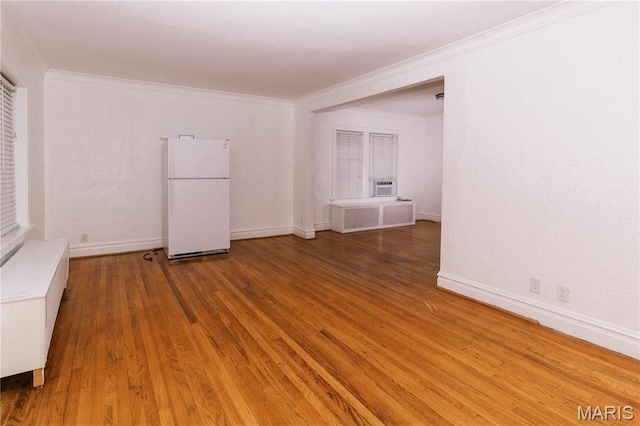 7360 Dartmouth Ave, University City, MO 63130 - spare room with wood finished floors, ornamental molding, and cooling unit